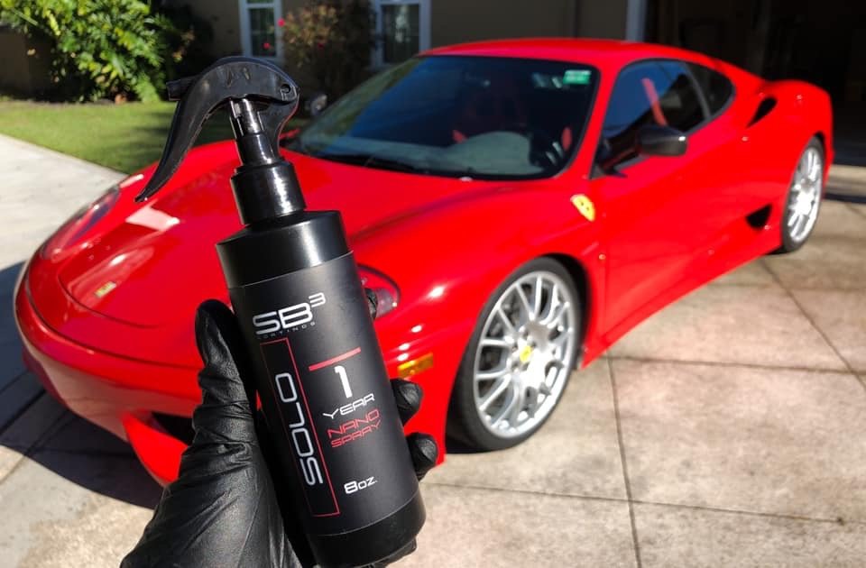 Ceramic coating service showing glossy vehicle paint